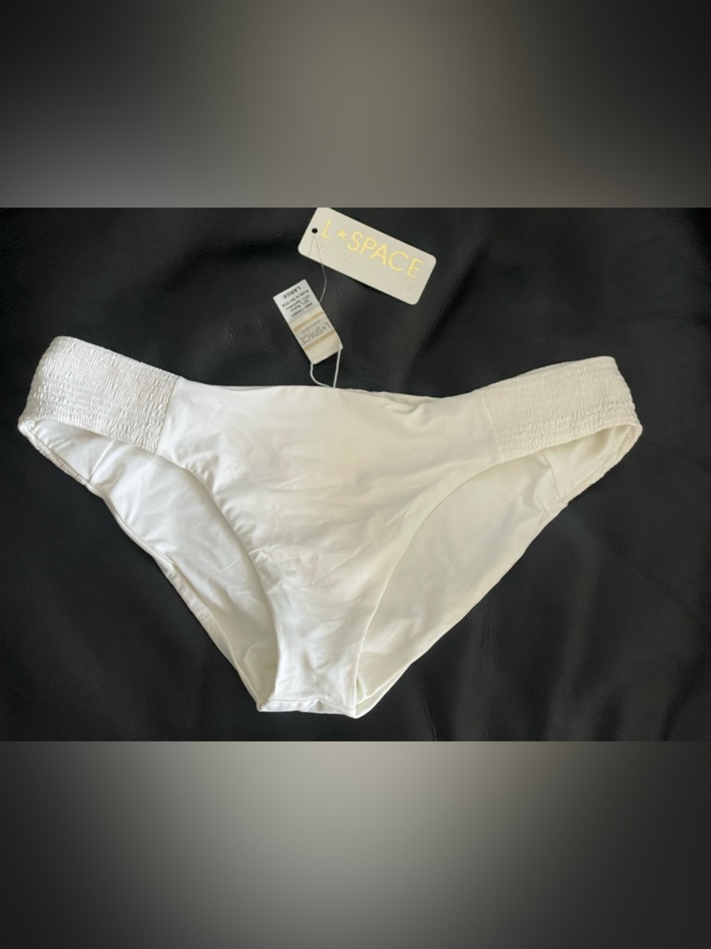 L Space bikini bottom with smocked sides NWT. Size Large. White.